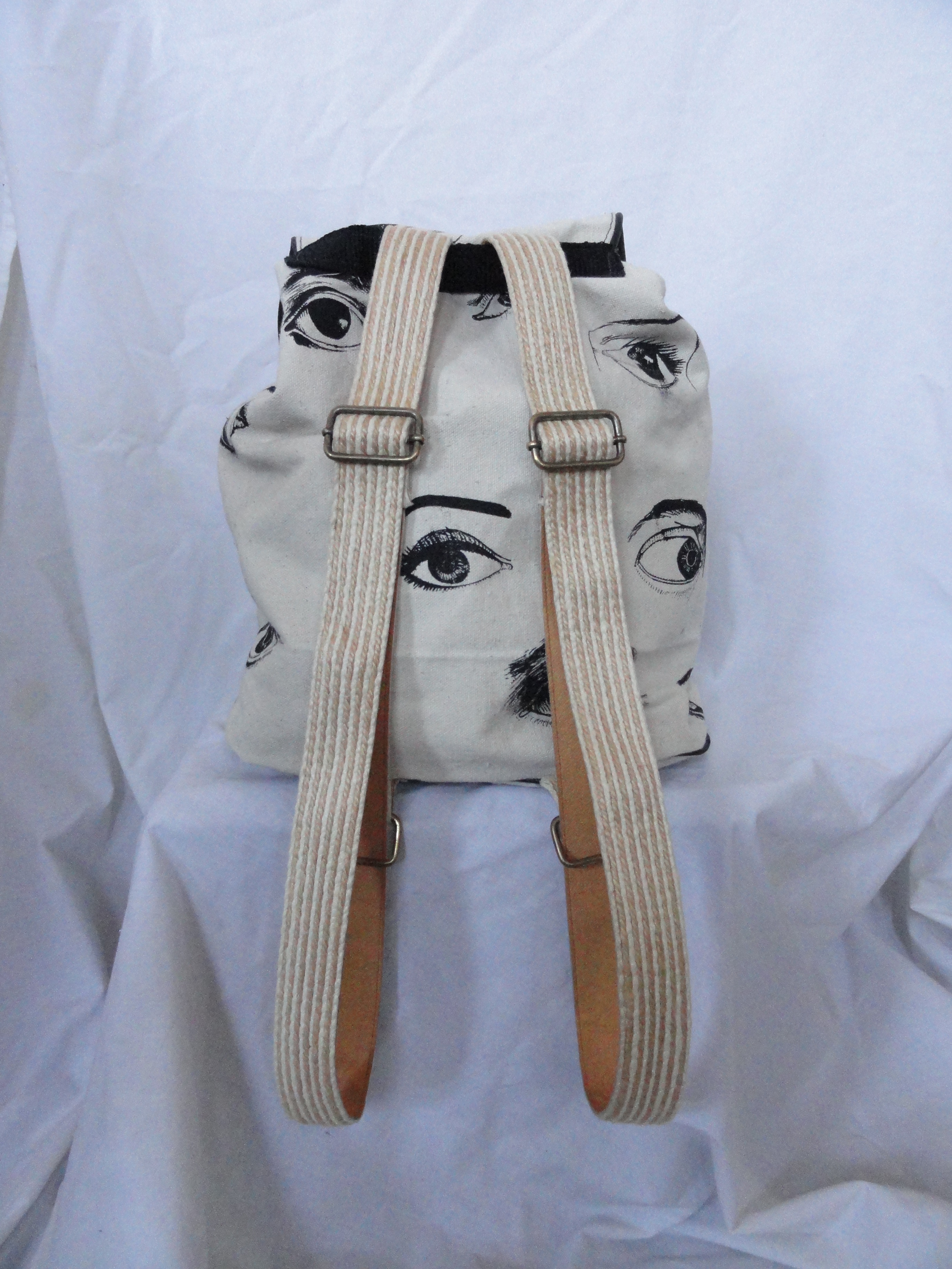 backpack with an eye pattern on it